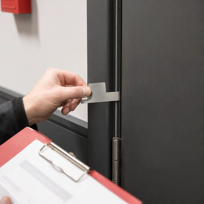 Fire door gap and seal inspection detail